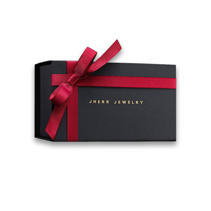 a black box with a red ribbon around it