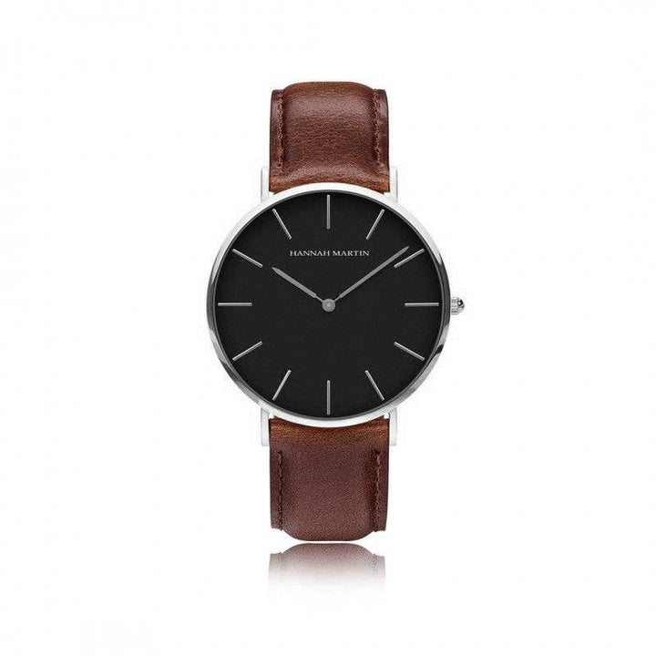 a black and brown watch on a white background