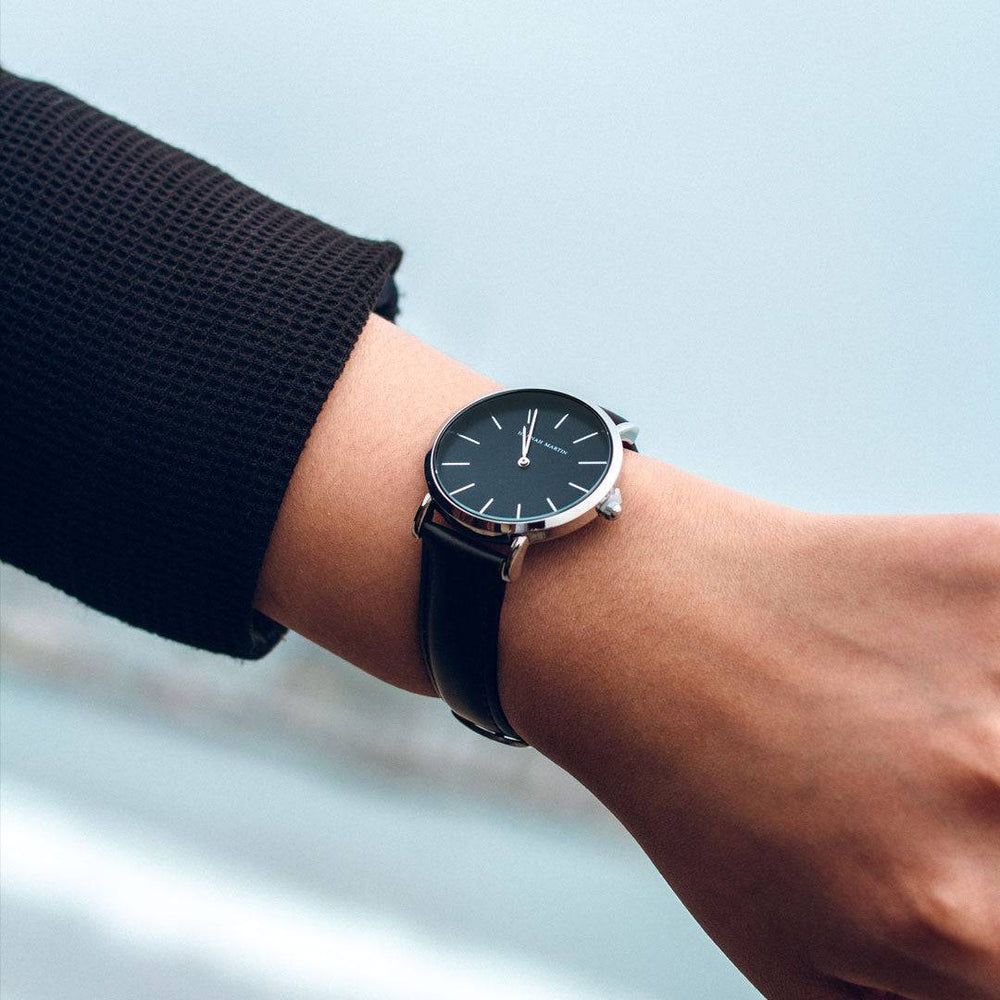 a close up of a person wearing a watch