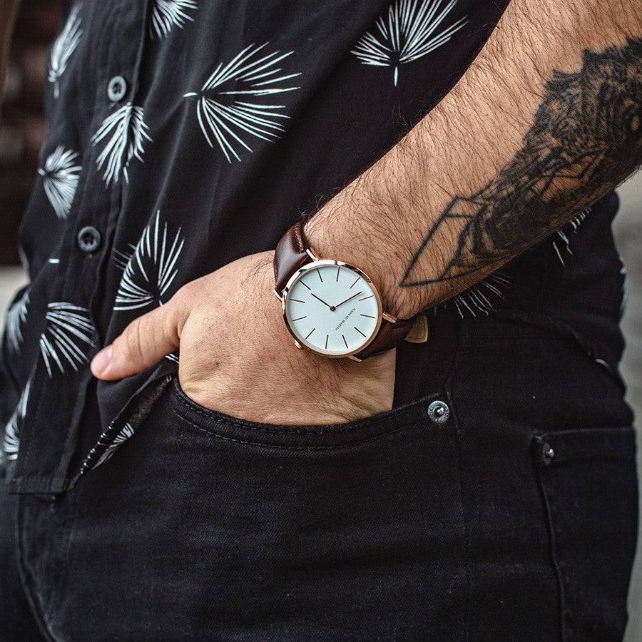 a close up of a person wearing a watch