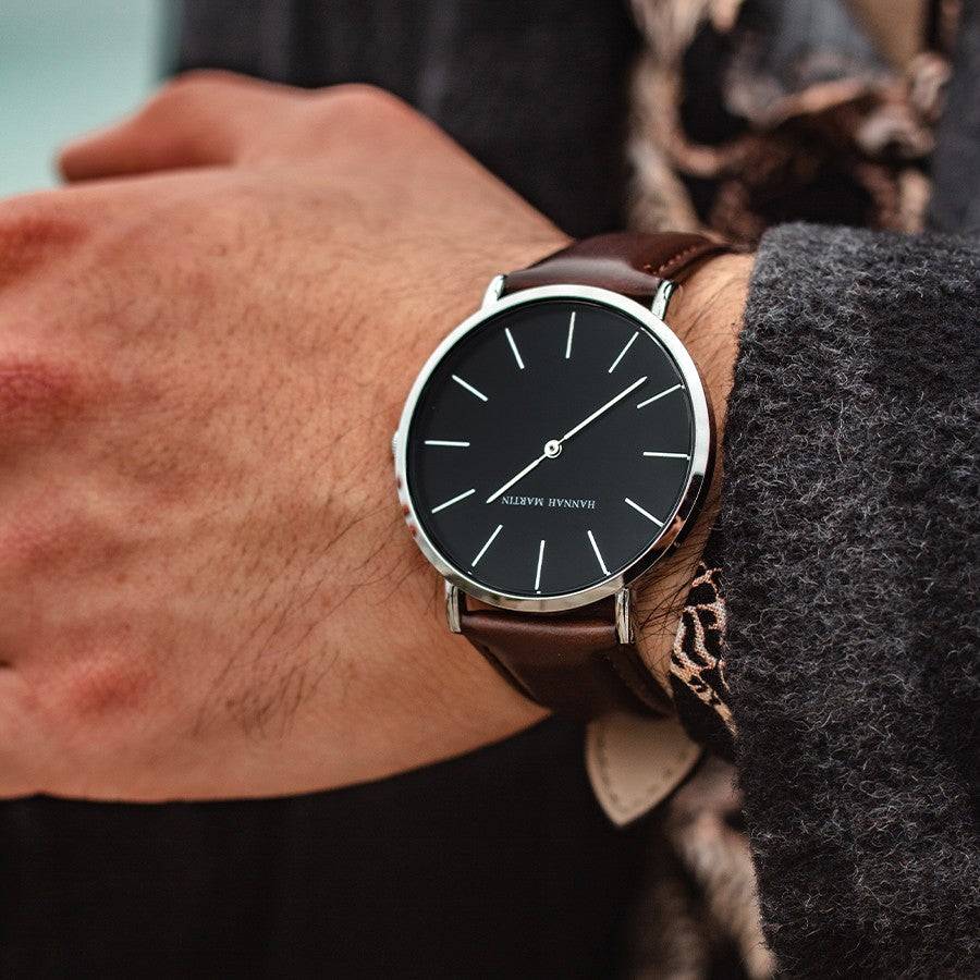 a close up of a person wearing a watch