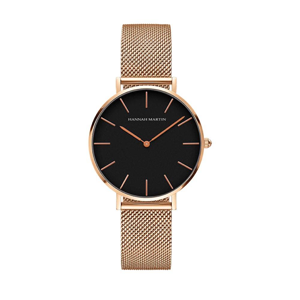 a black and gold watch on a white background