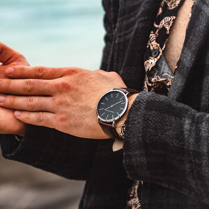 a person with a watch on their wrist